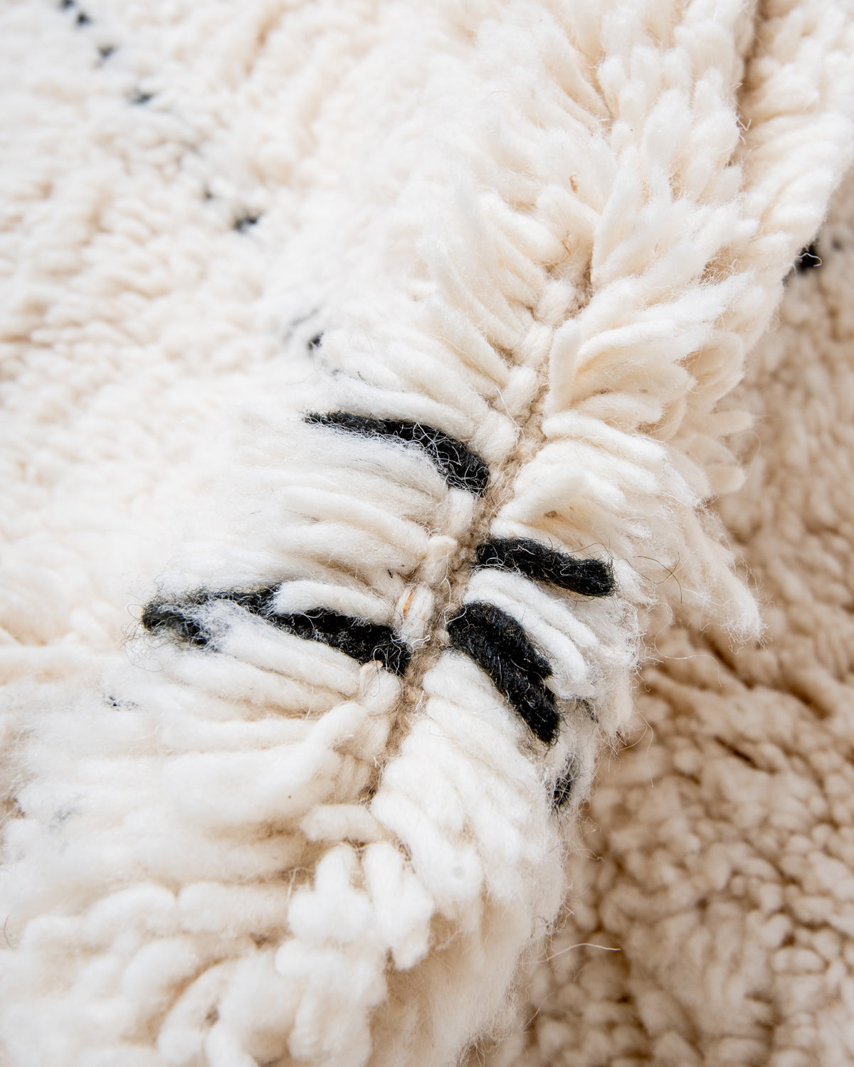 Modern, designer, handcrafted Berber rug from Morocco. Beniourain carpet with minimalist design, natural wool pile and a fluffy texture.